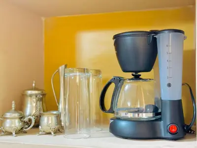 a blender sitting on top of a counter at Apartamento completo Ideal para descansar en familia en San Salvador in San Salvador
