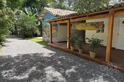 a building with a sign that reads just be miracles at Comfy Bedroom in a hostal at Coatepeque lake in El Congo